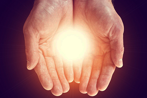 image of hands and light