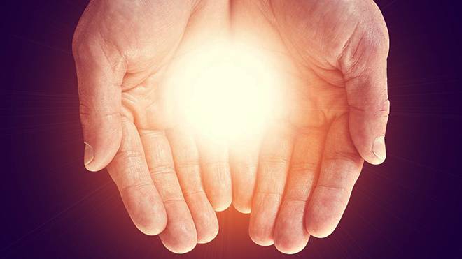 image of hands and light