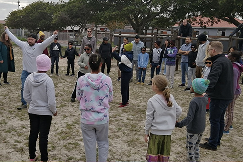 image of emba trip to home of hope