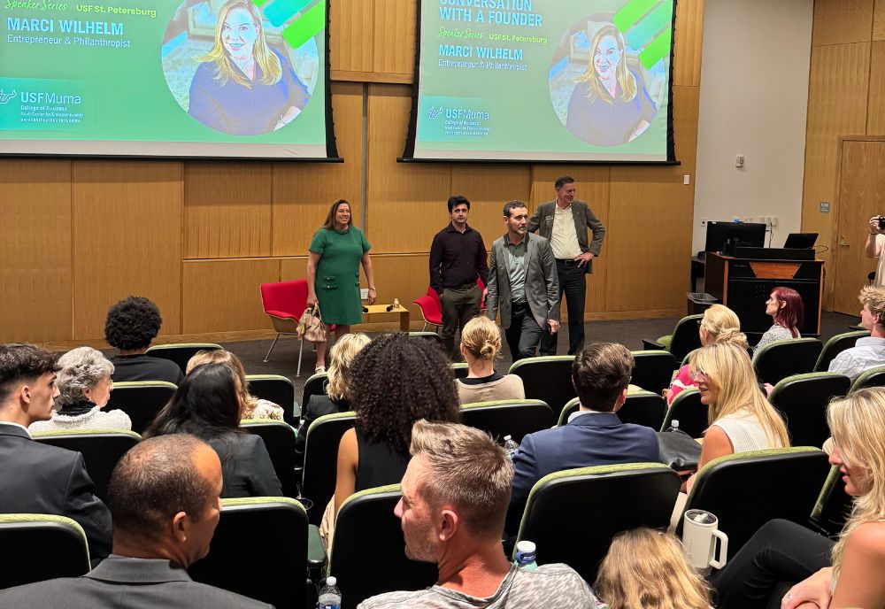 Marci Wilhelm, center left, prepares to speak to an audience of students and community members at USF’s St. Petersburg campus on Oct. 28 as part of the Nault Center for Entrepreneurship’s “Conversation With a Founder” series.