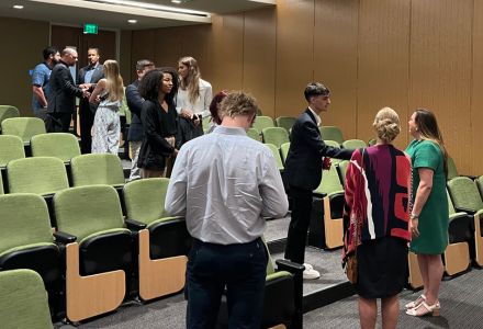 Students line up to meet Marci Wilhelm following her keynote.