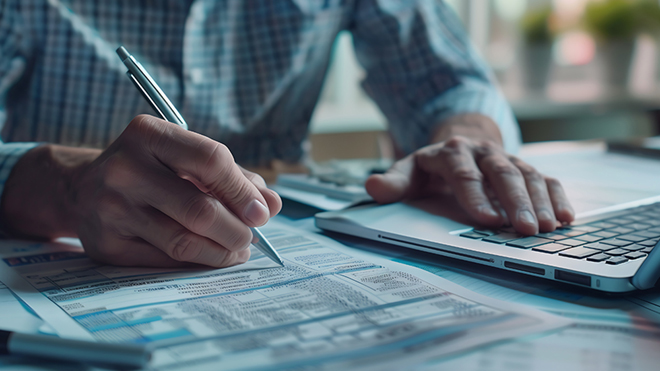 image of someone doing taxes