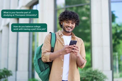 student looking at his phone