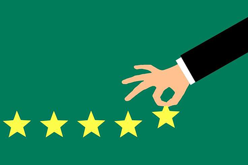 graphic of stars and a hand