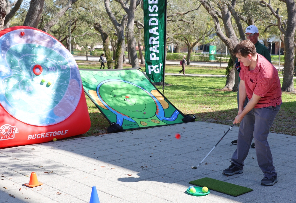 A student uses the golf game