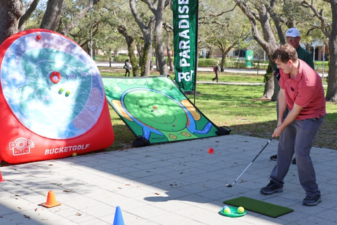 A student uses the golf game
