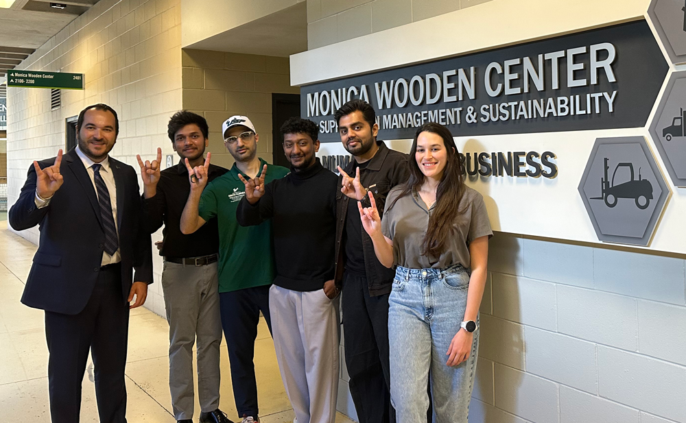 Seçkin Özkul with graduate research assistants from the USF Supply Chain Innovation Lab at the Monica Wooden Center for Supply Chain Management & Sustainability