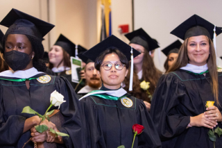graduates during fall commencement
