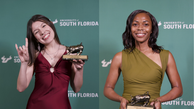 Two students holding Golden Bull awards