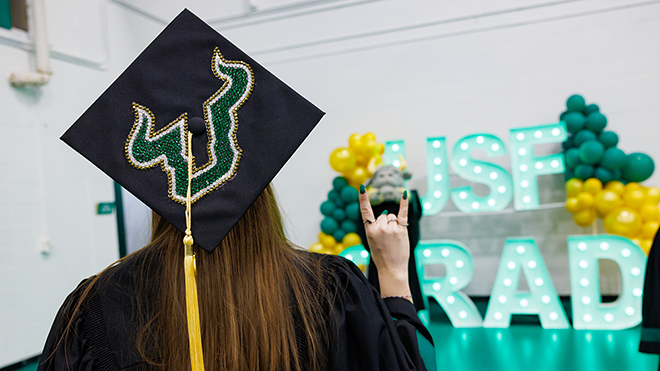 Student in cap and gown