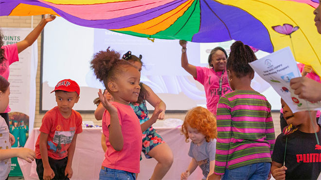 Children play at event