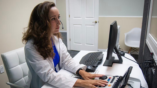 Madison Dowdy at computer