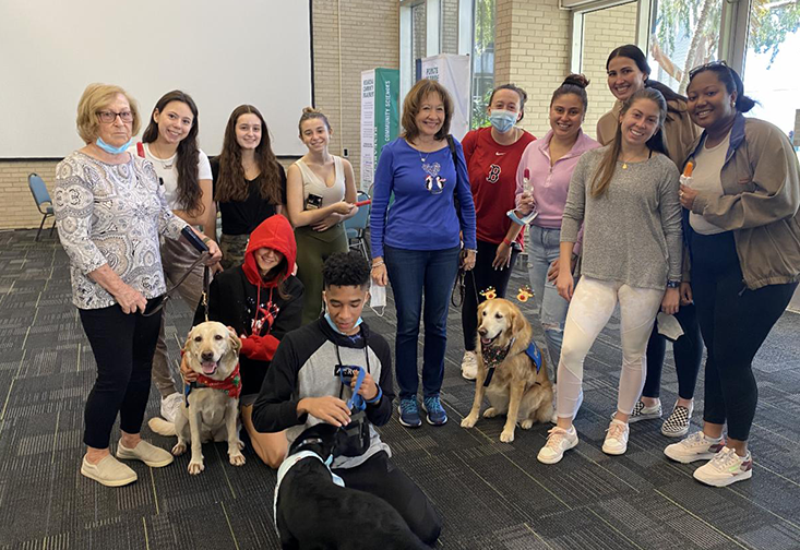 CBCS hosts "Pups  & Popsicles" in the MHC Atrium.