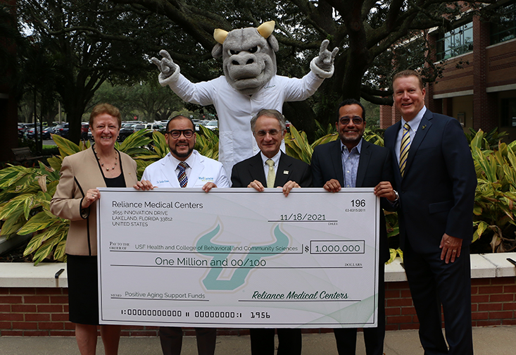 Dean Julie Serovich, and representatives of USF Health, Reliance Medical Centers, and the USF Foundation