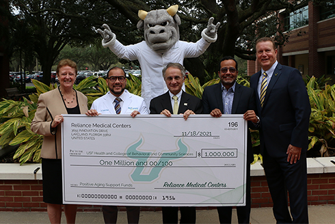 Dean Julie Serovich, and representatives of USF Health, Reliance Medical Centers, and the USF Foundation