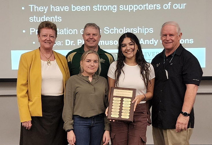 Julia Mikhail and Brittany Probus receive scholarships from the Sertoma Club 