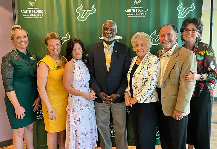 CBCS representatives, Dr. David Satcher, and the de la Parte family