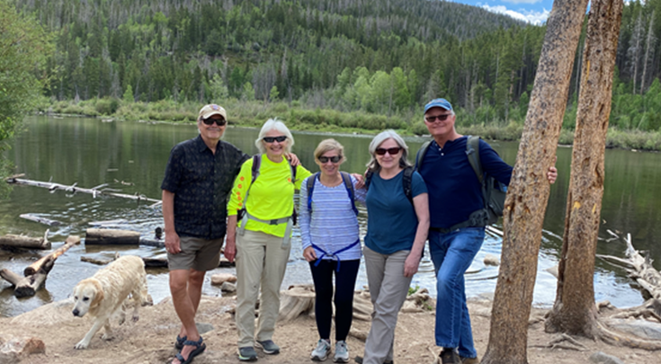 Lise Fox and colleagues hike.