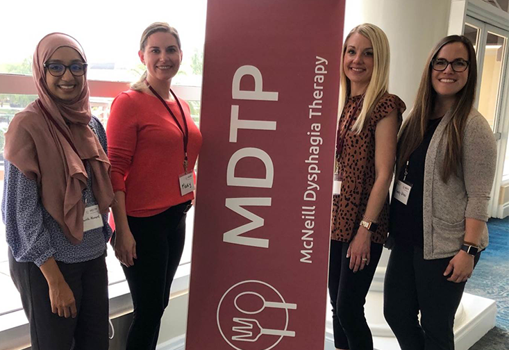 Speech-language pathology clinical instructors pose for a photo