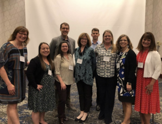 Group photo of organizers, presenters, and faculty