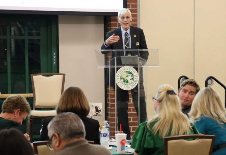 Dr. Greg Teague speaks from a podium at the Behavioral Healthcare 10 year anniversary celebration