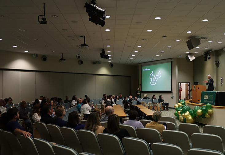 Gregory Teague speaks to attendees of the BHC pinning ceremony