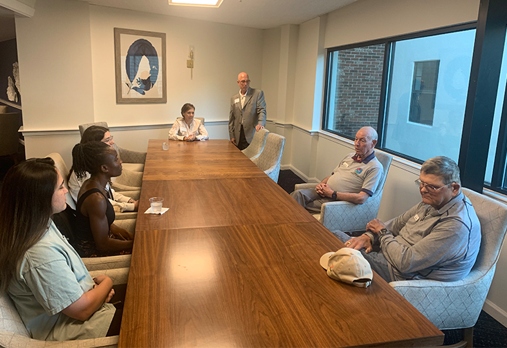 SAS students speak with admin and residents of Unisen Senior Living