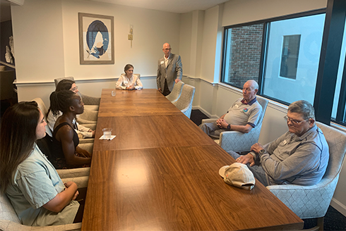 SAS students speak with admin and residents of Unisen Senior Living