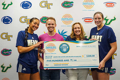 Mark Fleming, Christine Rover, and GA Tech athletes