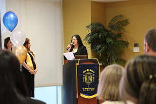 Bressia Borja speaks at the ceremony