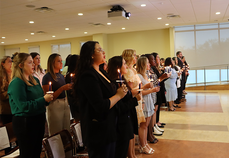 students are inducted into Alpha Phi Sigma