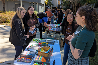 Lou Hernandez speaks with students 