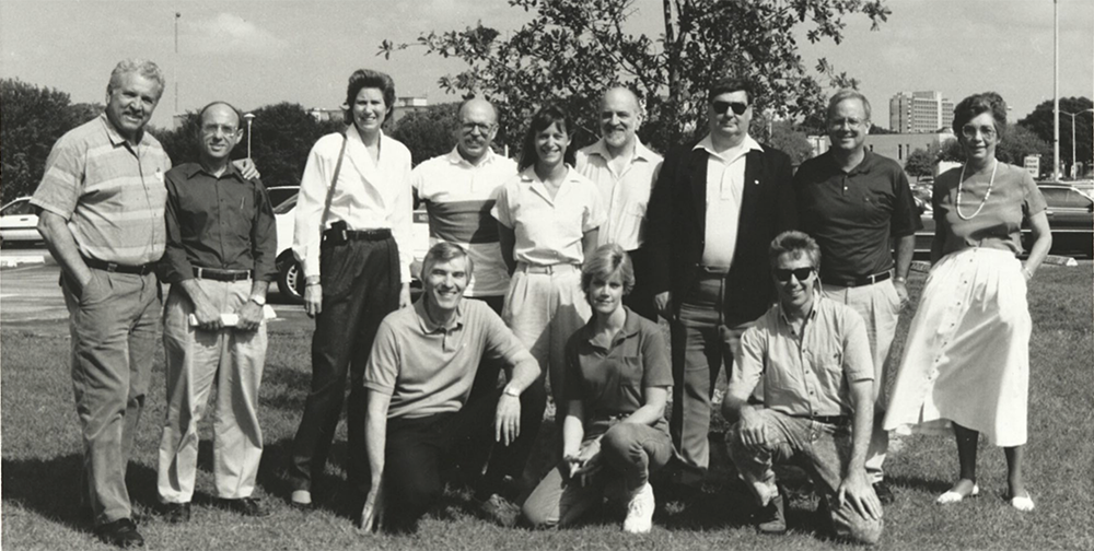 Black and white group photo of faculty and staff