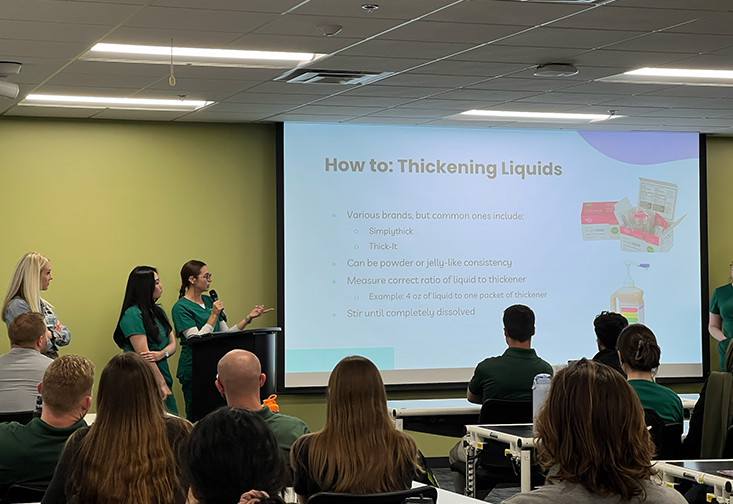 SLP students give a presentation on thickening liquids