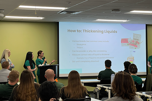 SLP students give a presentation on thickening liquids