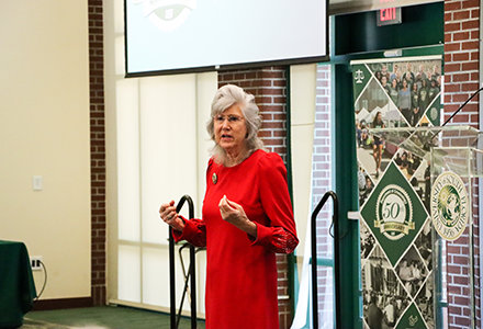 Heide speaks at an event