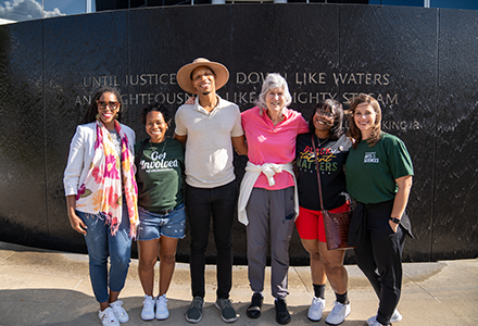 Group photo including Heide, faculty, and students
