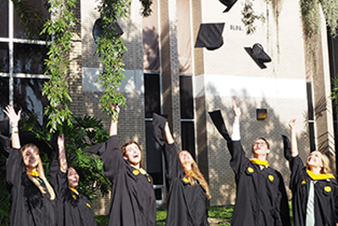 MFT graduates toss their caps