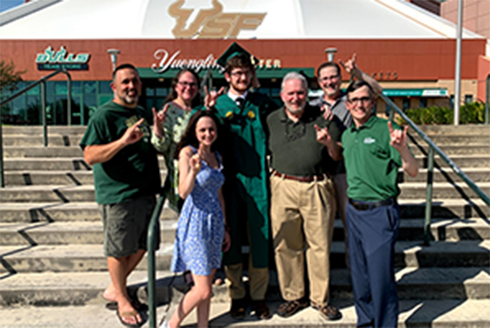 Kelin Griffin and her family pose in front of the Yuengling Center