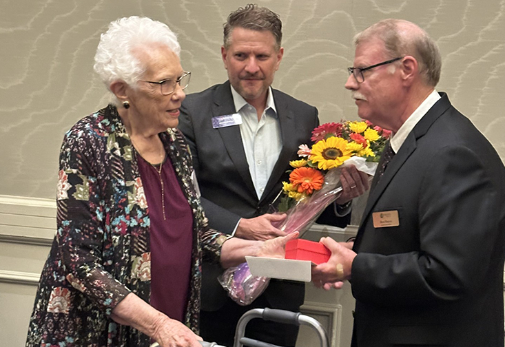 Mary Jean Etten is honored by Empath Health-Stratum representatives.
