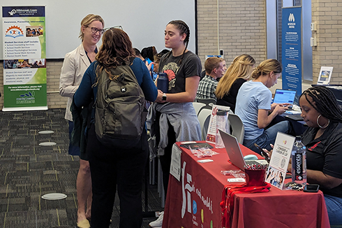 People attend the social work job fair