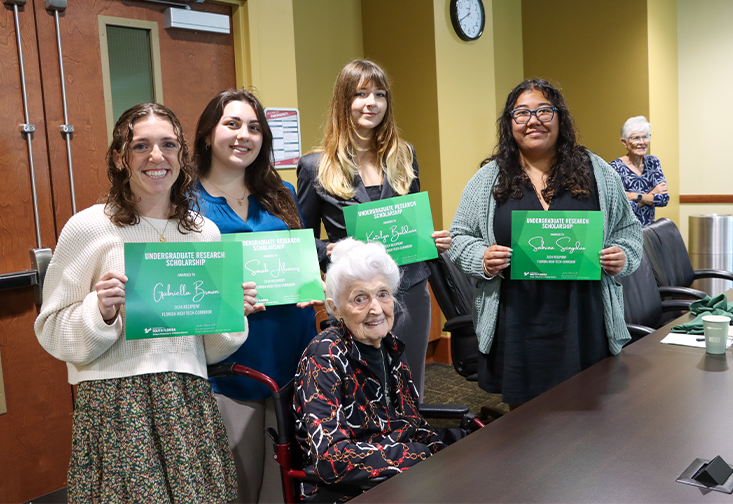 scholarship recipients and Ellen Nizzi