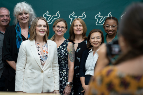 U.S. Congresswoman Kathy Castor stands with a group of USF professors and researchers whose work contributes to the TIP Lab.