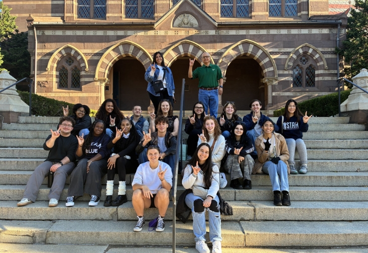 ASL students take a group photo in front of Gallaudet University with the USF bulls symbol
