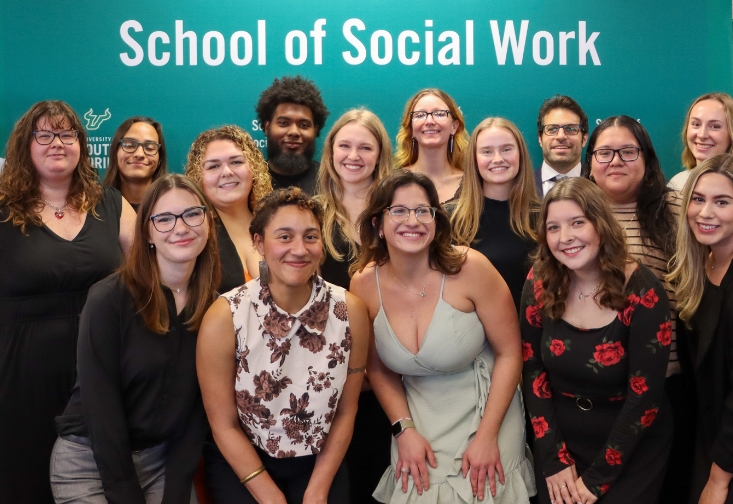 Celebrating students gather at pinning ceremony