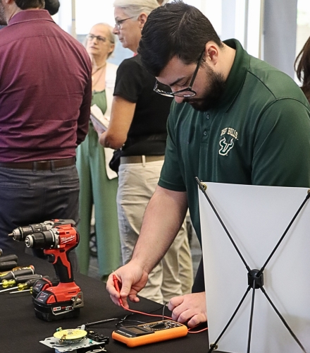 DIVE-VRT information session participant uses tools during demo