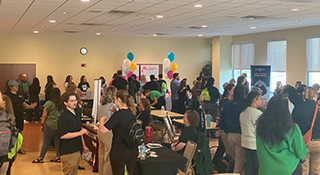 Students, faculty, staff and professionals at the Faces of the Future event