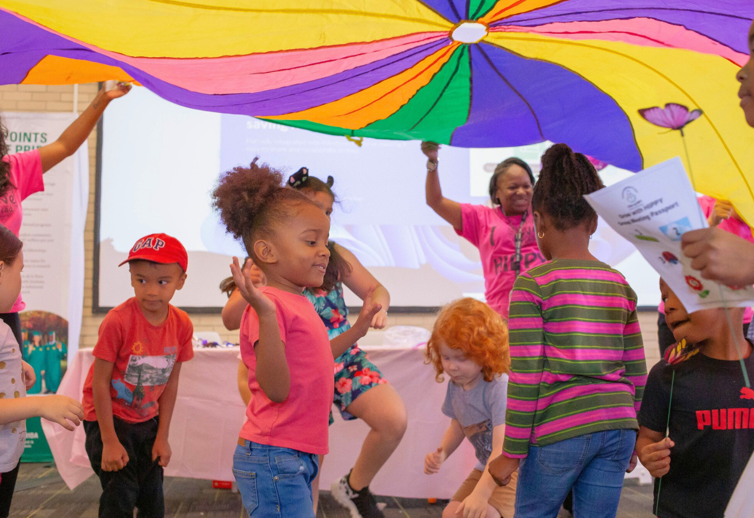 Children joining in a group activity