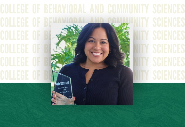 Leury Peña with her Dissertation Award by the Foundation for the Advancement of Human Systems