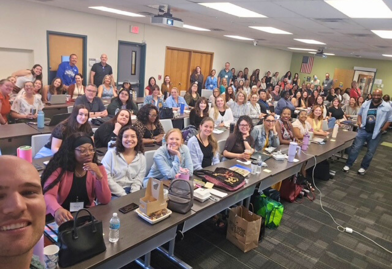 Large group of faculty, staff and students in the MFT and EFT program 